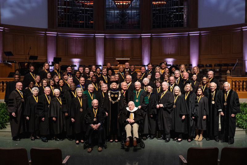 A group of Wake Forest alumni delegates, with Ed Wilson ('43) at front, in Wait Chapel.